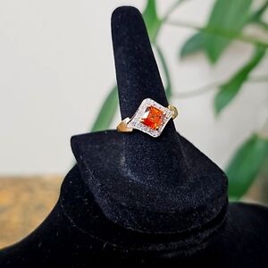 14k with chocolate diamond or sapphire and white diamonds